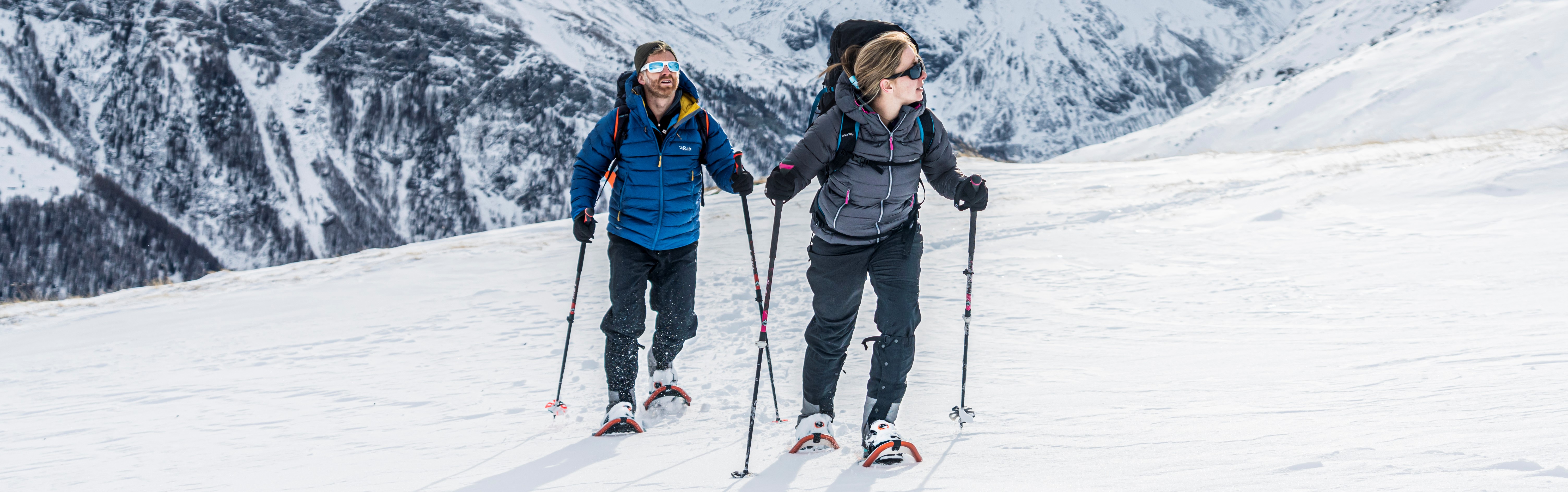 Mountain skiers scaling back up in their nikwax treated waterproof and sweatproof layers